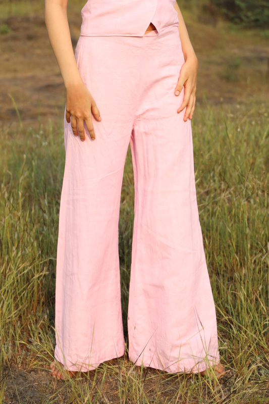 Pink Candy pants styled with matching waistcoat on model