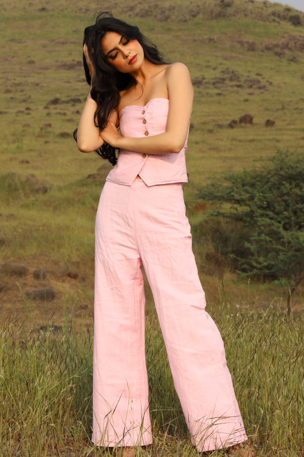 Pink Candy pants styled with matching waistcoat on model